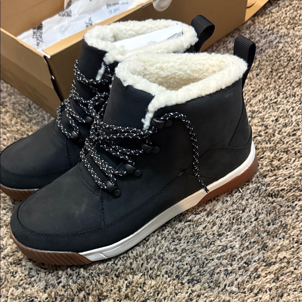 The North Face Black Boots with White and Brown Sole